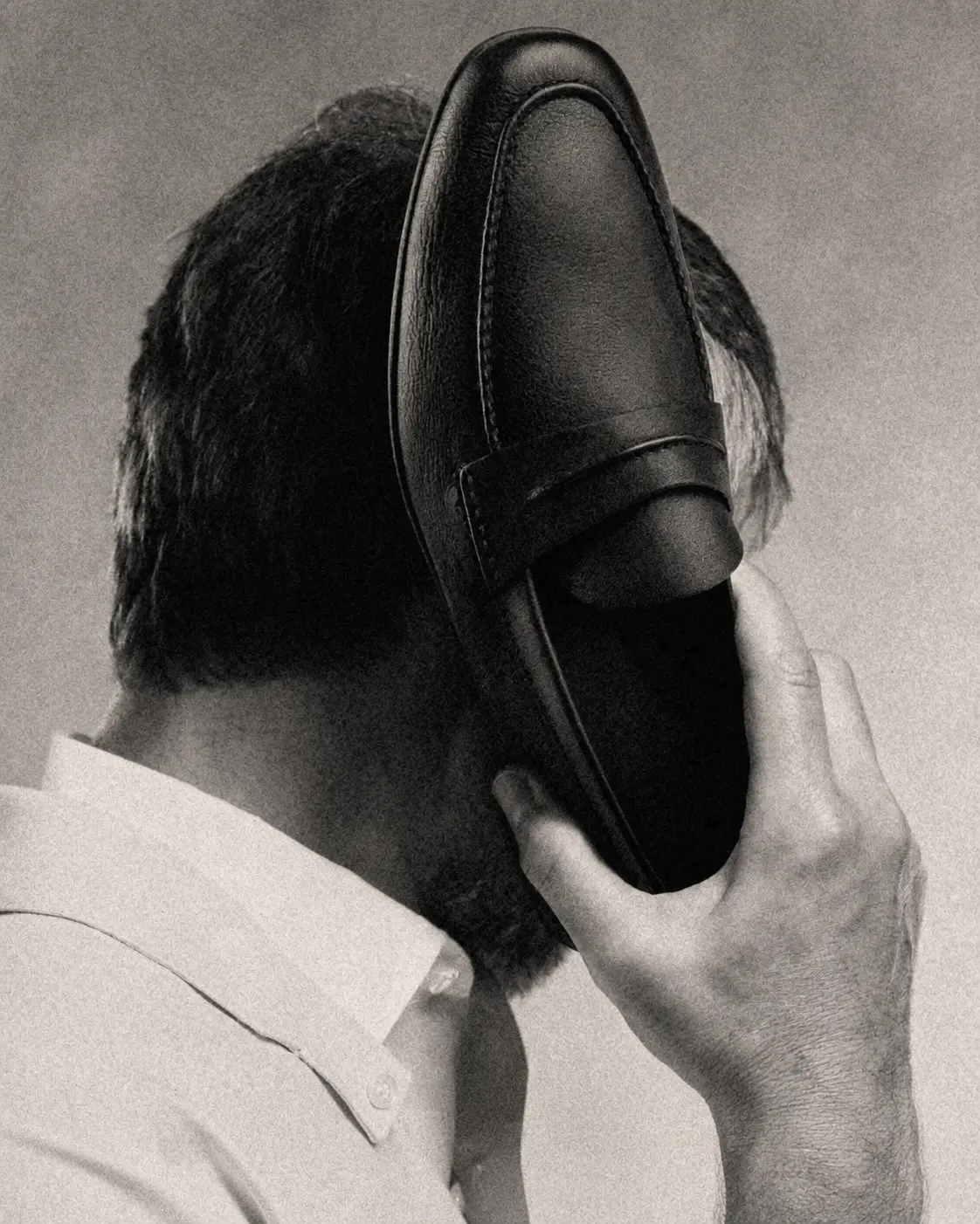 AI-generated black white loafer face portrait visual created by Officine AI